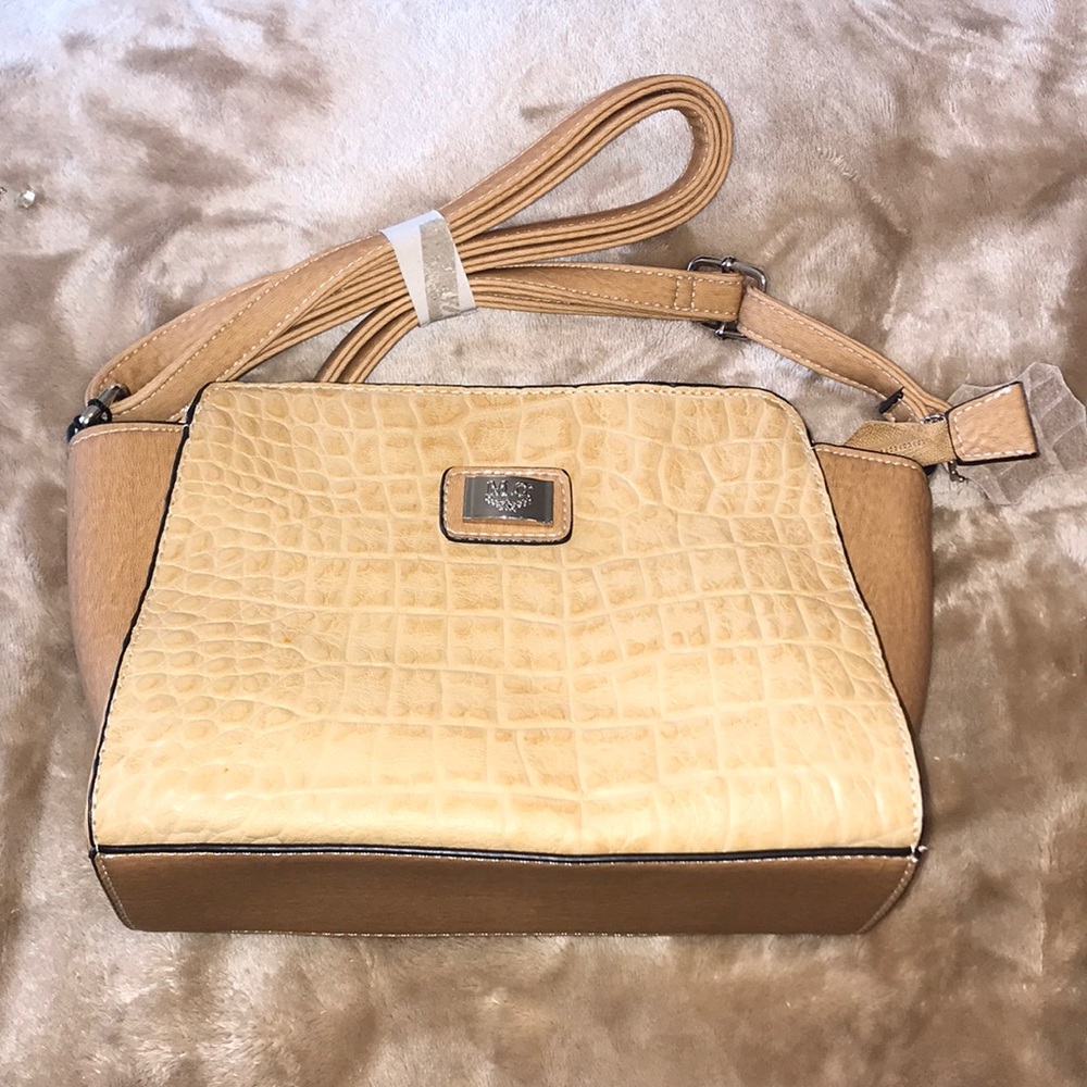M.C. Genuine Leather purse